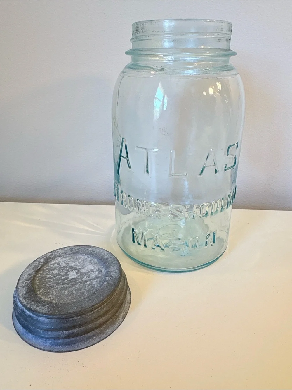 Atlas “strong shoulder” Embossed Blue Glass Mason Jar with Metal Lid